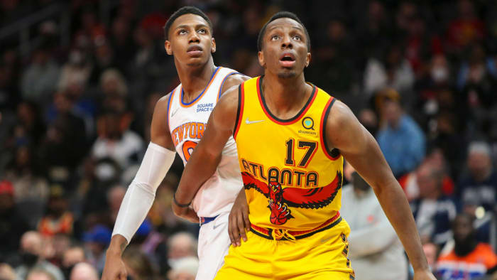 Atlanta Hawks forward Onyeka Okongwu (17) boxes out New York Knicks guard RJ Barrett.